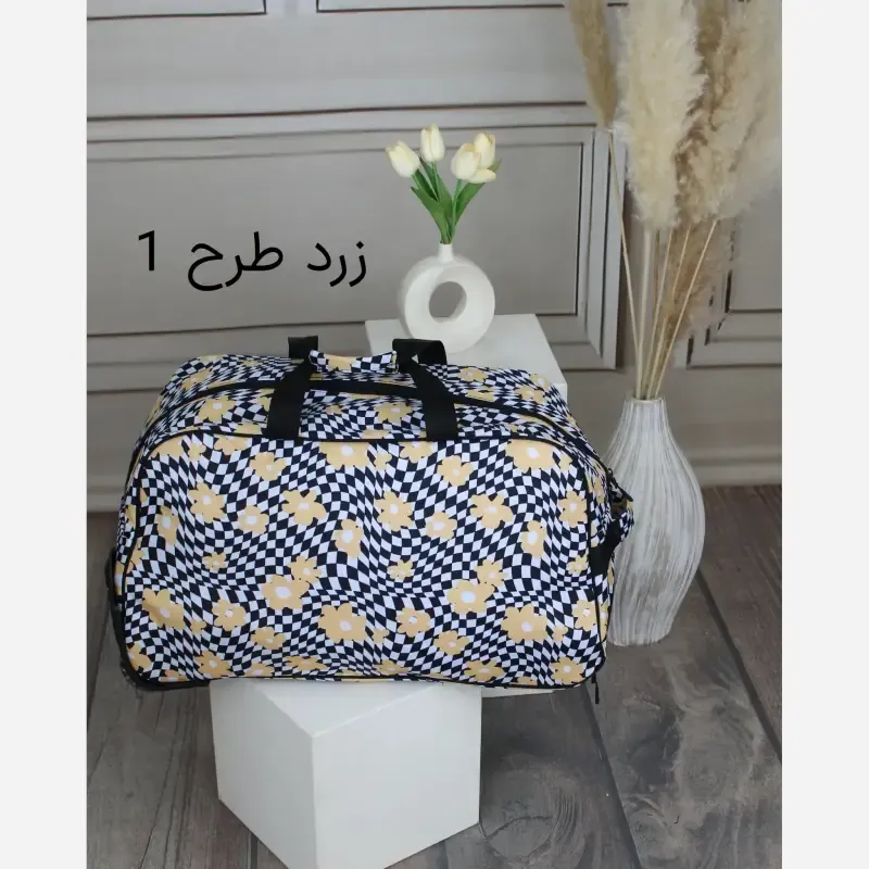 ساک مسافرتی چرم مصنوعی زنانه مدل زیپی ابعاد 56 در 33 سانتیمتر - تصویر 5