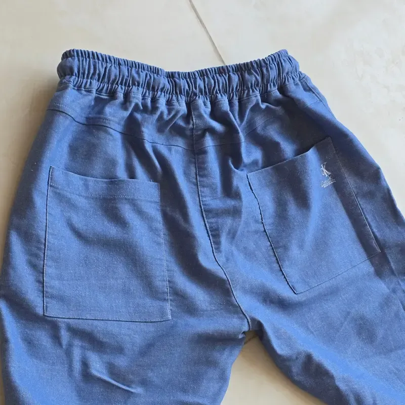 شلوار مام فیت پارچه بنگال کمرکش زنانه و مردانه در رنگبندی متنوع سایز XL و XXL - تصویر 6